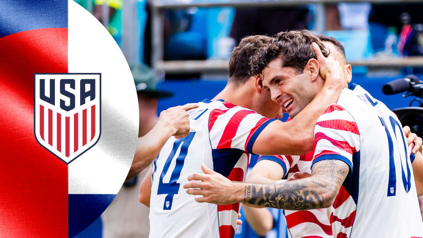 USMNT players celebrating in the stars-and-stripes kit